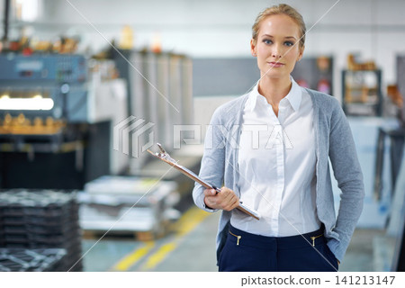 Woman, clipboard and factory in portrait for logistics with quality assurance in facility for inventory. Confident female person, checklist and manufacturing with storage, industry and distribution Woman, clipboard and factory in portrait for logistics with quality assurance in facility for inventory. Confident female person, checklist and manufacturing with storage, industry and distribution 141213147