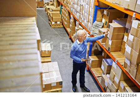 Tablet, box or top view of man in warehouse for delivery order, storage or stock in factory for website. Printing, mature manager or supply chain inspection for cargo, package or wholesale shipping Tablet, box or top view of man in warehouse for delivery order, storage or stock in factory for website. Printing, mature manager or supply chain inspection for cargo, package or wholesale shipping 141213164