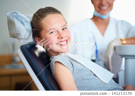Dentist chair, exam or portrait of girl in consultation room for mouth, gum or wellness. Dental, cleaning or teeth whitening by kid consulting orthodontist for tooth, growth or braces and development Dentist chair, exam or portrait of girl in consultation room for mouth, gum or wellness. Dental, cleaning or teeth whitening by kid consulting orthodontist for tooth, growth or braces and development 141213170
