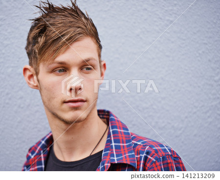 Haircut, thinking and male person for beauty, trendy and hairstyle on studio background. Face, contemporary and spikes hair from gel for handsome man model, punk and confidence with funky style Haircut, thinking and male person for beauty, trendy and hairstyle on studio background. Face, contemporary and spikes hair from gel for handsome man model, punk and confidence with funky style 141213209