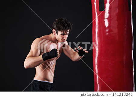 Man, punching bag or workout with fitness, exercise or fighter with progress or wellness with cardio. Boxer, practice or athlete with training, balance or martial arts with endurance and healthy guy Man, punching bag or workout with fitness, exercise or fighter with progress or wellness with cardio. Boxer, practice or athlete with training, balance or martial arts with endurance and healthy guy 141213245