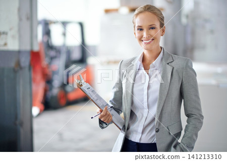 Business woman, warehouse and clipboard in portrait, production and logistics at shipping company. Manager, happy and checklist for distribution, trade and job in factory, supply chain and industry Business woman, warehouse and clipboard in portrait, production and logistics at shipping company. Manager, happy and checklist for distribution, trade and job in factory, supply chain and industry 141213310