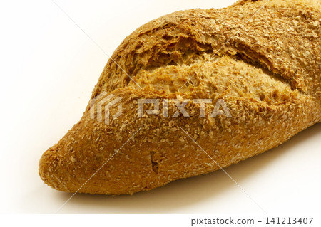one loaf of bread close-up on a white backgroundv one loaf of bread close-up on a white backgroundv 141213407