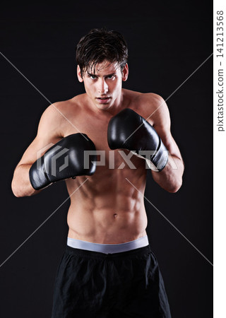 Man, portrait and boxing gloves in studio for workout fight or martial arts training or performance, black background or challenge. Male person, face and sports exercise or fitness, athlete or mockup Man, portrait and boxing gloves in studio for workout fight or martial arts training or performance, black background or challenge. Male person, face and sports exercise or fitness, athlete or mockup 141213568