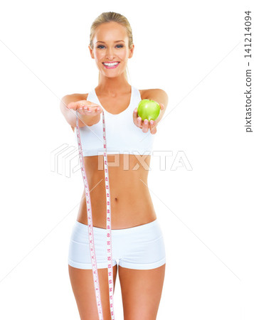 Woman, smile and portrait with apple and measuring tape for detox, diet and fitness on white background. Young person, nutritionist or dietician with fruit for weight loss, health and vitamins Woman, smile and portrait with apple and measuring tape for detox, diet and fitness on white background. Young person, nutritionist or dietician with fruit for weight loss, health and vitamins 141214094
