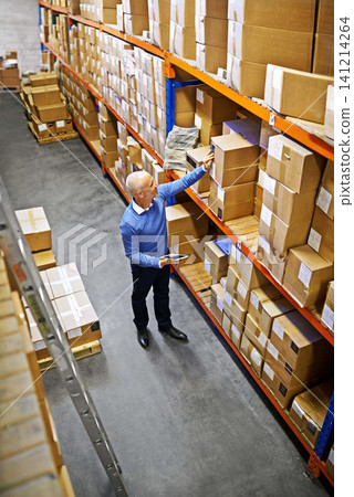 Tablet, boxes or above of man in factory for delivery order, storage or stock in warehouse for website. Printing, mature manager or supply chain inspection for cargo, package or wholesale shipping Tablet, boxes or above of man in factory for delivery order, storage or stock in warehouse for website. Printing, mature manager or supply chain inspection for cargo, package or wholesale shipping 141214264