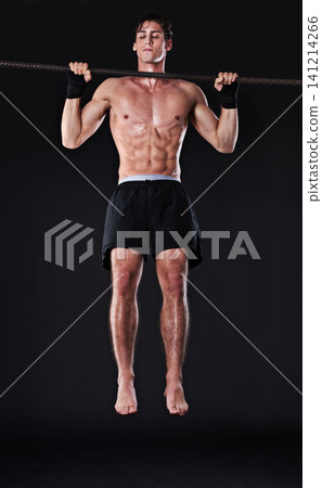 Man, bar and pull up for arm exercise in studio for bicep training or muscle building, gym or workout. Male person, fitness and black background for bodybuilding performance, wellness or mockup space Man, bar and pull up for arm exercise in studio for bicep training or muscle building, gym or workout. Male person, fitness and black background for bodybuilding performance, wellness or mockup space 141214266