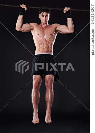 Man, pull up and arm exercise in studio for bicep training or muscle building, gym or workout. Male person, bar and fitness on black background for bodybuilding performance, wellness or mockup space Man, pull up and arm exercise in studio for bicep training or muscle building, gym or workout. Male person, bar and fitness on black background for bodybuilding performance, wellness or mockup space 141214267