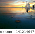 Beautiful Sunset over Still Water 141214647