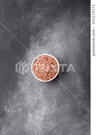 Fish, canned tuna chunks in brine for sandwiches and salads. Canned tuna Fish, canned tuna chunks in brine for sandwiches and salads. Canned tuna 141214771