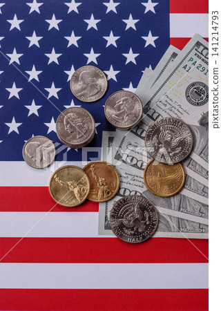 Paper US dollar bills of various denominations and cent coins as a business tool. Cash US dollars Paper US dollar bills of various denominations and cent coins as a business tool. Cash US dollars 141214793