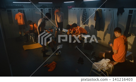 Young Football Players Spending Time Together in Locker Room after Practice Young Football Players Spending Time Together in Locker Room after Practice 141216403