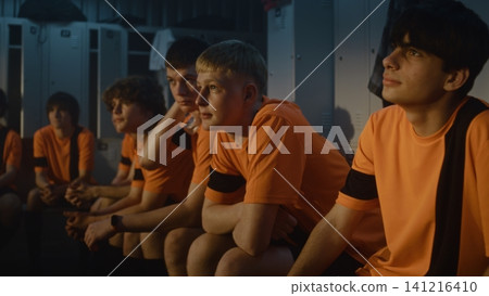 Sport Education and Theory, Coach Briefing Young Players in Locker Room Sport Education and Theory, Coach Briefing Young Players in Locker Room 141216410