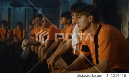 Teenage Football Team, Young Athletes Listening Intently to Coach Teenage Football Team, Young Athletes Listening Intently to Coach 141216416