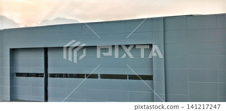 Building facade with gray wall panels Building facade with gray wall panels 141217247