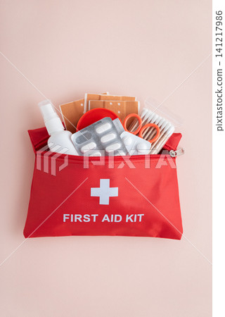 First aid kit containing medical supplies for home safety First aid kit containing medical supplies for home safety 141217986