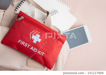 First aid kit in a bag with medical essentials 141217989