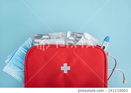 Red first aid kit with medical supplies for healthcare Red first aid kit with medical supplies for healthcare 141218003