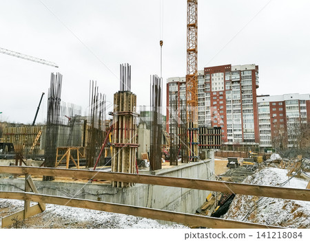 Urban construction site with concrete foundations and steel reinforcement structures Urban construction site with concrete foundations and steel reinforcement structures 141218084