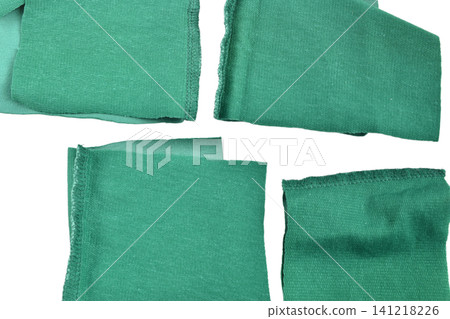 Textured pattern made of green fabric. Textured pattern made of green fabric. 141218226