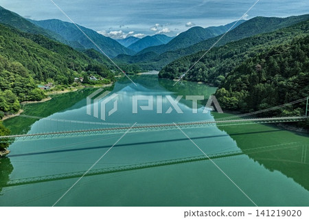 Aerial photograph capturing Lake Ikawa and the Ikawa Bridge in Shizuoka Prefecture. Aerial photograph capturing Lake Ikawa and the Ikawa Bridge in Shizuoka Prefecture. 141219020