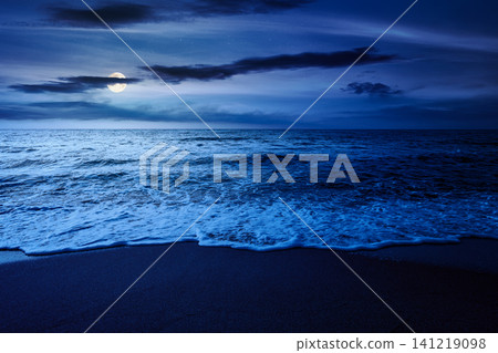 black sea landscape in summer at night. full moon over bulgaria nature landscape with sandy beach. mysterious summer vacation at the sea shore concept. waves and empty beach. remote vacation scene black sea landscape in summer at night. full moon over bulgaria nature landscape with sandy beach. mysterious summer vacation at the sea shore concept. waves and empty beach. remote vacation scene 141219098