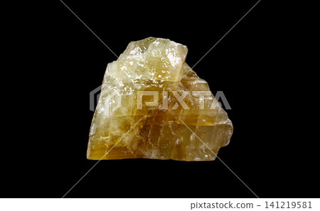Golden Gemstone Texture: Yellow Calcite Isolated on Black Background 141219581