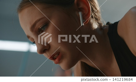 Distressed Teen Athlete Reclaiming Emotional Control in Changing Room 141219684