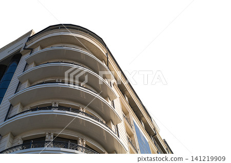 Bottom view of multi-storey building with round corner, panoramic balconies with 270-degree view isolated on white background with clipped path. Architectural elements in modern urban building 141219909