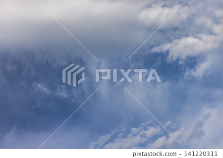 Blue sky with white and grey stratocumulus clouds Blue sky with white and grey stratocumulus clouds 141220311