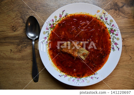 Tasty and creamy tomato soup made of fresh tomatoes 141220697