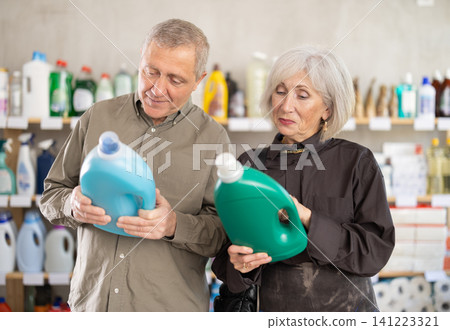 Senior spouses select and studies label liquid detergent 141223321