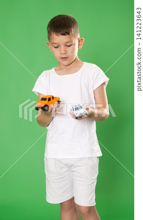 Boy with toy cars Boy with toy cars 141223643