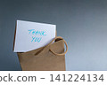 Thank you card with a brown paper gift bag 141224134