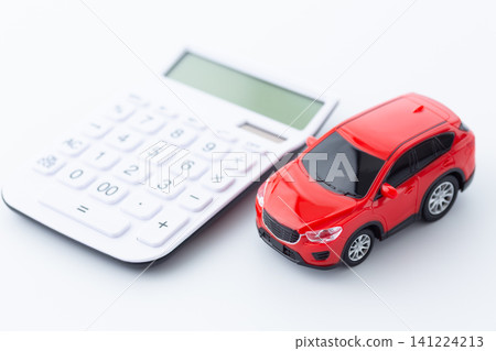 A red car and a white calculator A red car and a white calculator 141224213