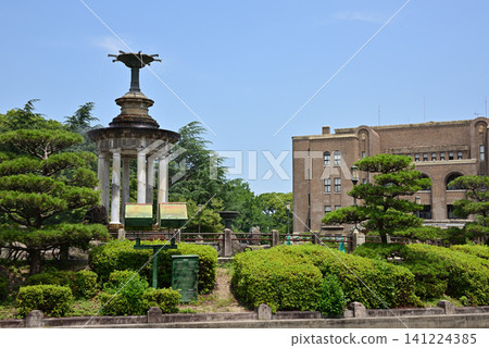 The fountain tower in Tsurumai Park, Nagoya City, and the historic Nagoya City Public Hall. The fountain tower in Tsurumai Park, Nagoya City, and the historic Nagoya City Public Hall. 141224385