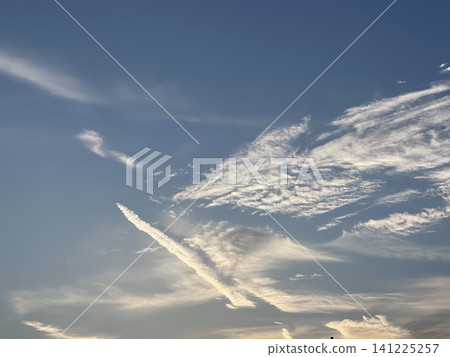 Airplane Contrail And White Cirrus Clouds In Blue Sky Airplane Contrail And White Cirrus Clouds In Blue Sky 141225257