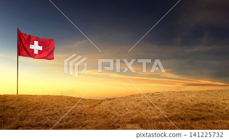 The national flag of Switzerland flutters on a hilltop under a dramatic sunset sky with dark storm clouds. Concept of Swiss National Day 141225732