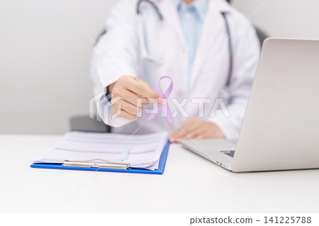 Doctor give light purple ribbon for concept of All cancer, April Esophageal Cancer, November gastric and Stomach cancer, Hodgkin Lymphoma, Awareness month and February World cancer day concept Doctor give light purple ribbon for concept of All cancer, April Esophageal Cancer, November gastric and Stomach cancer, Hodgkin Lymphoma, Awareness month and February World cancer day concept 141225788