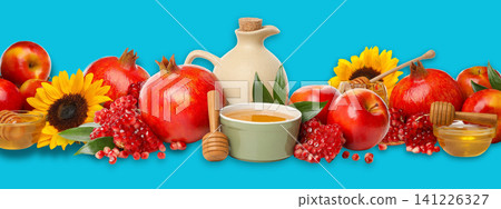 Vivid backdrop of pomegranates, honey, sunflowers, and oil Vivid backdrop of pomegranates, honey, sunflowers, and oil 141226327