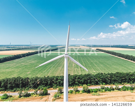 Worker performing technical inspection inside wind turbine housing. blades with brake on mode Worker performing technical inspection inside wind turbine housing. blades with brake on mode 141226659