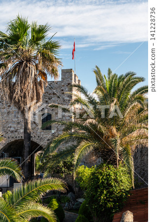 Castle courtyard with garden and ancient walls in Marmaris Turkey Castle courtyard with garden and ancient walls in Marmaris Turkey 141228736