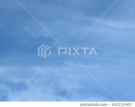 Blue Skies with wispy chemtrail aeroplane lines and fluffy white clouds Blue Skies with wispy chemtrail aeroplane lines and fluffy white clouds 141232465