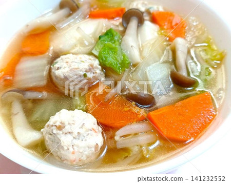 Homemade chicken meatball soup with lots of ingredients 141232552