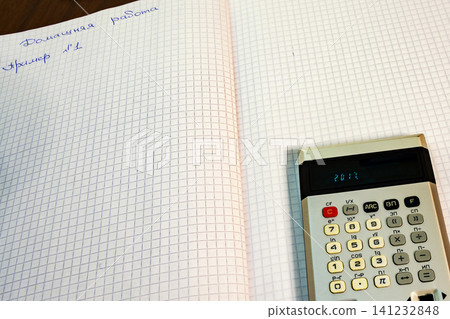 The pages open notebook lay calculator 141232848