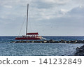 By Sea stones along the sails sailing catamaran 141232849
