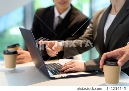 Business person having a meeting in the office Business person having a meeting in the office 141234545
