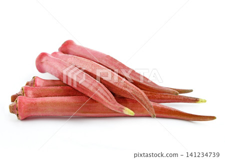 Long, red okra purchased at a direct sales market. Long, red okra purchased at a direct sales market. 141234739