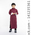Smiling cute Asian boy in traditional Chinese clothing 141235361