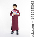 Smiling cute Asian boy in traditional Chinese clothing 141235362